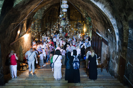 Jerusalem,  Israel - November 6, 2010: People in  the Mary's Tomb Churchのeditorial素材