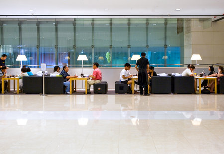 Hong Kong, China - September 23,  2007: People  in a coffee bar of  the IFC Mall.のeditorial素材