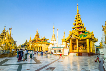 Yangon,  Myanmar - January 9, 2012:  Local people in the Swedagon Pagoda.のeditorial素材