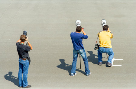 Losail,  Qatar - February 25, 2006:  Photographers at work in the Losail racing circuitのeditorial素材