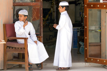 Doha,  Qatar - April 8, 2006: Local youg people in the Souq Wakif in the old city centerのeditorial素材