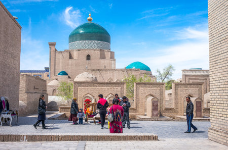 Khiva, Uzbekistan - Aprilr 14, 2014:  The Phalavan Mahmud mausoleum seen from the city centerのeditorial素材