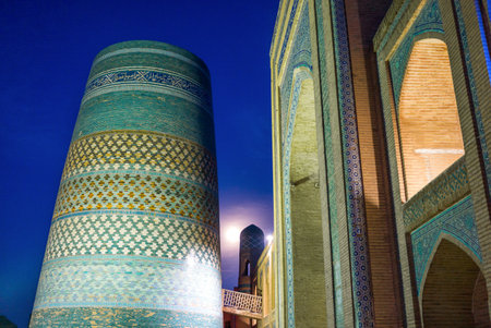 Uzbekistan, Khiva, night view of the Kalta Minor minaret at Muhammad Amin Khan Madrassahのeditorial素材
