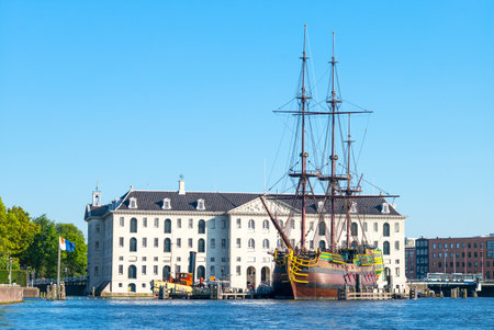 Amsterdam, Holland - July 23, 2014:  An ancient sailing ship in front of the Maritime Museumのeditorial素材