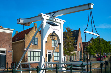 Monnickemdam, Holland - July 24, 2014: Waterland district,  a small drawbridge in the old townのeditorial素材