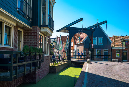Volendam, Holland - July 24, 2014: Waterland district, a drawbridge in the town centerのeditorial素材