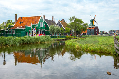Zaandam, Holland - July 25, 2014:  Typical country houses, stores and millのeditorial素材