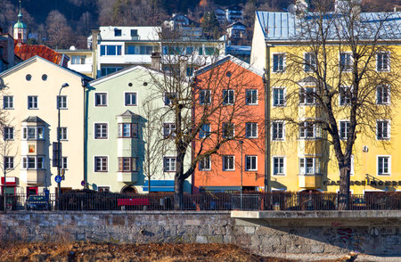 Innsbruck, Austria - February 8, 2010:  The Mariahilf strasse colored houses on the Inn riverのeditorial素材