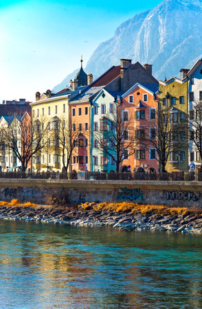 Innsbruck, Austria - February 8, 2010:  The Mariahilf strasse colored houses on the Inn riverのeditorial素材