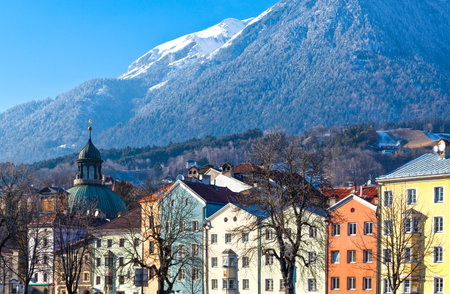 Austria, Tyrol, Innsbruck, the Mariahilf strasse colored houses on the Inn riverのeditorial素材