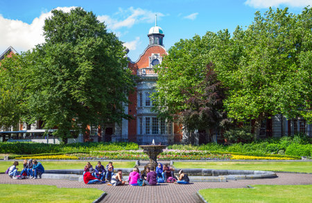 Dublin,  Ireland - July 30, 2013:  People in he St Patrik's gardensのeditorial素材