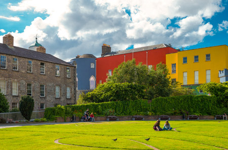 Dublin,  Ireland - July 30, 2013:  People in the Dublin Castle gardensのeditorial素材