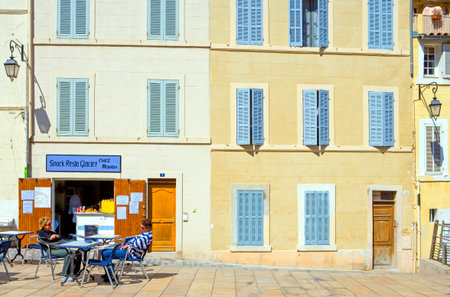 Marseille, France - April 29, 2006: People and traditional stores in the main square of the old district Le Panierのeditorial素材