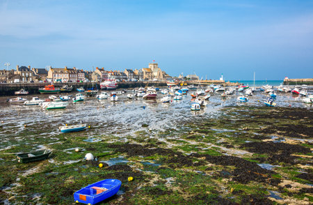 Barfleur,  France - May 21, 2012: Normandy, view of the harbor and boats at low tide, near the village.のeditorial素材