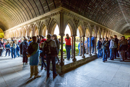 Mont St. Michel, France - May 22, 2012: Normandy, tourists in the cloister of the abbey.のeditorial素材