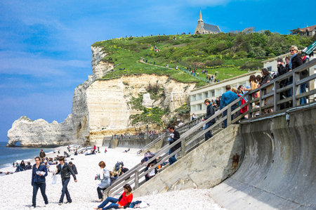 Etretat, France - May 19, 2012: Normandy, local people relaxing on the beach near the cliffs .のeditorial素材