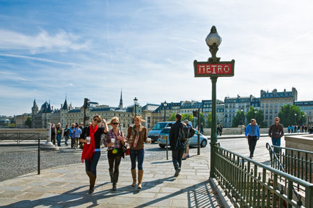 Paris,  France - October 3, 2009: The City Island, people walking toward the New Bridge.のeditorial素材