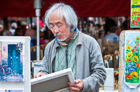 Paris,  France - October 4, 2009: Montmartre, painters in Place du Tertre.のeditorial素材