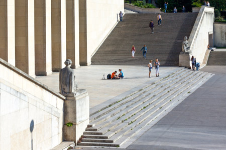Paris,  France - August 30, 2011:  Tourists between the statue of the TrocadÃ©ro Esplanade stairways.のeditorial素材