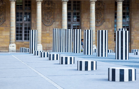 Paris,  France - August 31, 2011: People in the courtyard of the Royal Palace with 'The Columns' of D.Buren.のeditorial素材