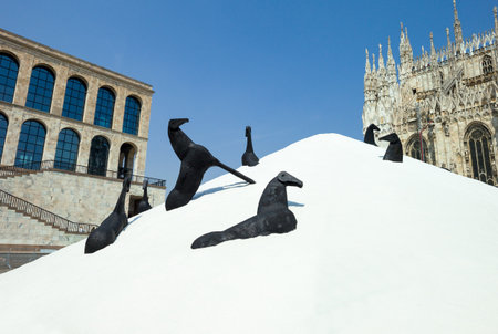 Milan, Italy - April 21, 2011: The "Montagna di Sale con Cavalli" artwork of Mimmo Paladino in Duomo squareのeditorial素材