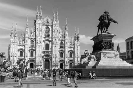 Milan, Italy - July 5, 2014: People in Duomo square under the Vittorio Emanuele II monumentのeditorial素材