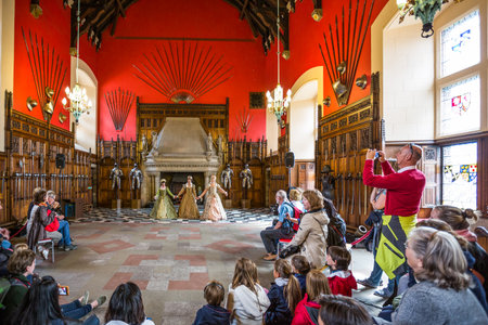 Edinburgh, Scotland - July 28, 2012: Performance in medieval dress in the great hall of the Royal Palace in the Edinburgh castle.のeditorial素材