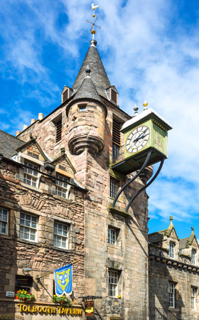 Edinburgh, Scotland - July 28, 2012: Royal Mile, Canongate, the Old Toolboth palace and clock.のeditorial素材