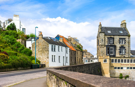 South Queenferry, Scotland - July 29,2012: Lothian area, traditional houses in High Street with an the Italian retaurant on the right,のeditorial素材