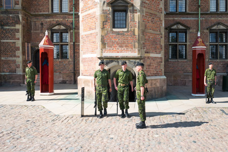 Copenhagen, Denmark - July 20, 2015: The changing of the guards ta the entrance of the Rosenborg castleのeditorial素材