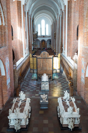 Roskilde, Denmark - July 23, 2015: Visitors and royal tombs in the nave of the medieval Cathedralのeditorial素材