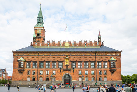 Copenhagen, Denmark - July 20, 2015: People in the square of the City Hall Palace and Towerのeditorial素材