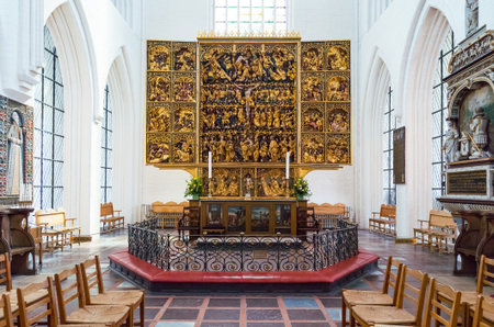 Odense, Denmark - July 21, 2015: The golden altarpieces of the gothic St. Canute's Cathedralのeditorial素材