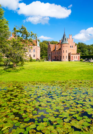 Kvaerndrup, Denmark - July 21, 2015: Panoramic view of the Egeskov castleのeditorial素材