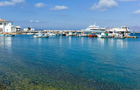 Mykonos, Greece - October 15, 2012: Boats in the harbor of the Chora villageのeditorial素材