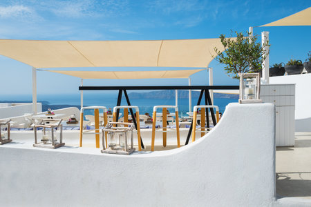 Santorini, Greece - October 17, 2015:  Fira, a bar restaurant on the caldera pathwayの写真素材
