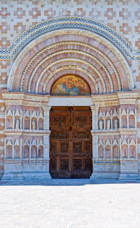 Italy, L'Aquila, the Santamaria di Collemaggio basilica (XIII century), detail of the main portalの写真素材