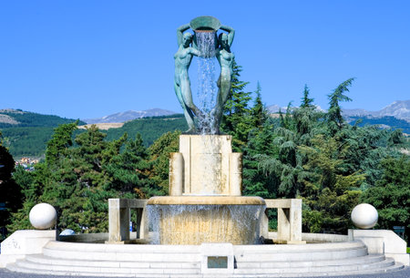 Italy, L'Aquila, the Conca fountain.  traditional copper container used to transport water.の写真素材
