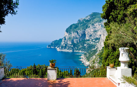 Italy, Capri, the Tragara bay seen from the terrace of an hotelの写真素材