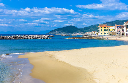 Italy,Cilento, Santa Maria di Castellabate, the beach with the country in the backgroundの写真素材