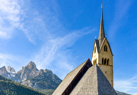 Italy, Dolomites, Pozza di Fassa, the parish church bell towerの写真素材