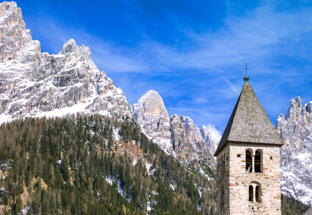 Italy, Dolomites, the bell tower of San Martino di Castrozza churchの写真素材