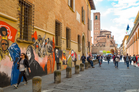 Bologna, Italy - May 5, 2016: Students in the University district with the St.Giacomo Maggiore church in the backgroundのeditorial素材