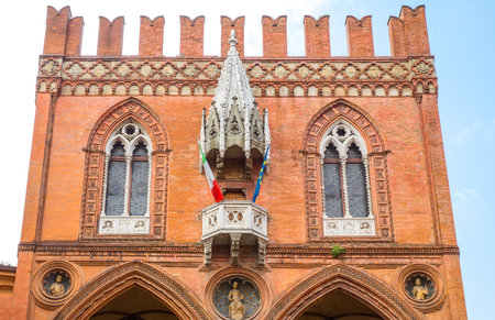 Italy, Bologna, upward view of the facade of the Della Mercanzia Palaceのeditorial素材