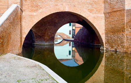 Italy, Comacchio, detail of the  Monumentale bridge  (or Della Pallotta bridge) XVII century.の写真素材
