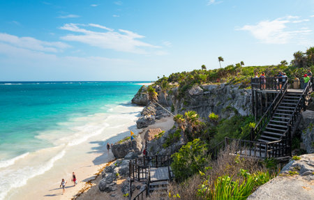 Tulum, Mexico - April 20, 2016:  Sea view from the Mayan city archaeological site with many touristsのeditorial素材