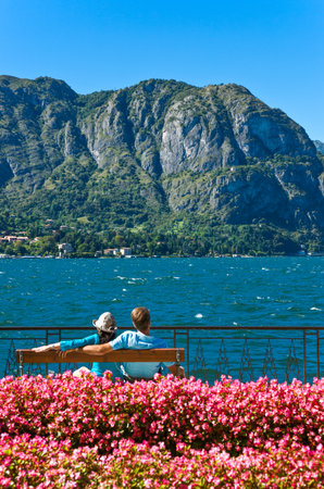 Bellagio, Italy - August 31, 2010: A young couple looking at the Como lakeのeditorial素材