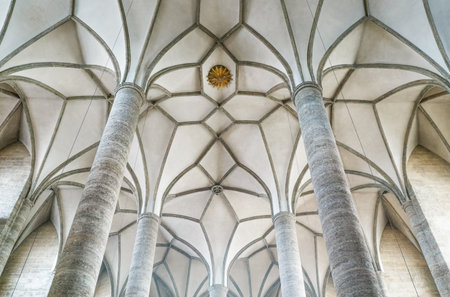 Salzburg, Austria - August 4, 2016: The pillars and Gothic voulted ceiling of the Franciscan church interiorのeditorial素材