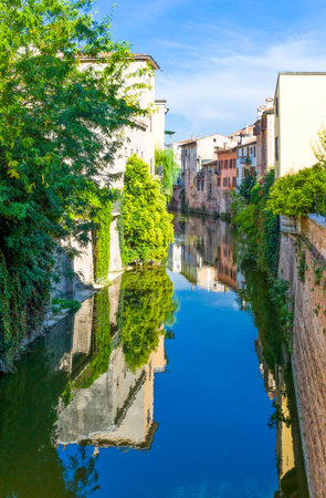 Italy, Mantova, houses on the  Canale Dei Gonzagaの写真素材