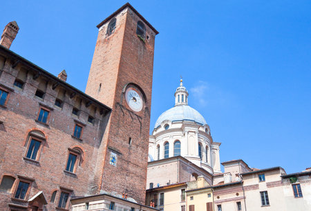 Italy, Mantova, the PodestÃ  palace clock tower in Sordello squareの写真素材